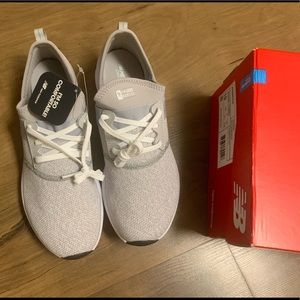 Never worn! NWOT and box, light gray New Balance trainers.